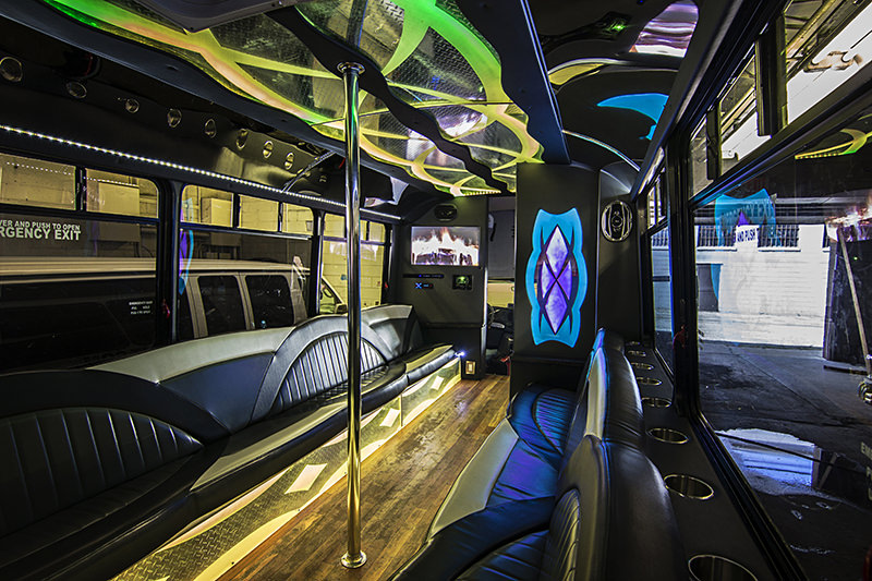 Neon lights inside of limo bus